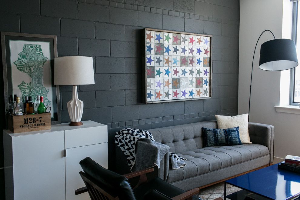 School House Electric for a Industrial Living Room with a Black Accent Wall and Alex's Condo by Residents Understood