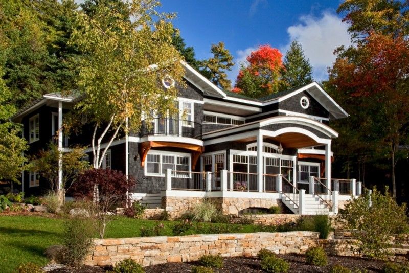 School House Electric for a Traditional Exterior with a White Cabinet and Legend of the Lake by Teakwood Builders, Inc.