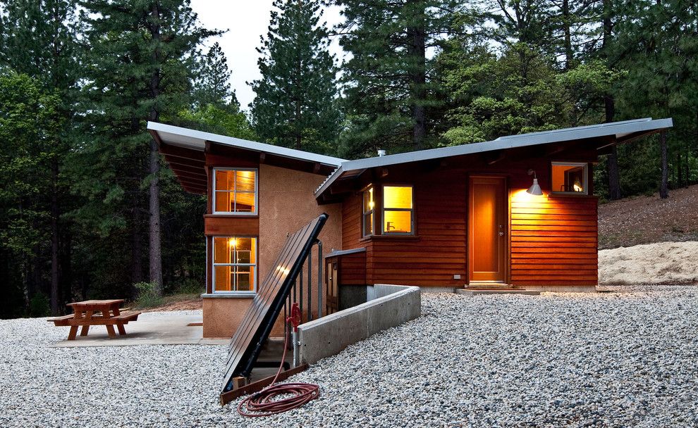 Senergy for a Rustic Exterior with a Solar Hot Water Collectors and Chalk Hill Off Grid Cabin by Arkin Tilt Architects