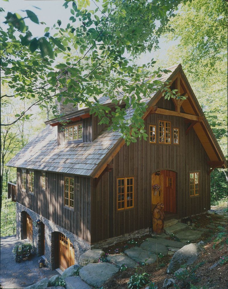 Sepulveda Building Materials for a Rustic Exterior with a Stone Walkway and Timberpeg Carriage House by Timberpeg