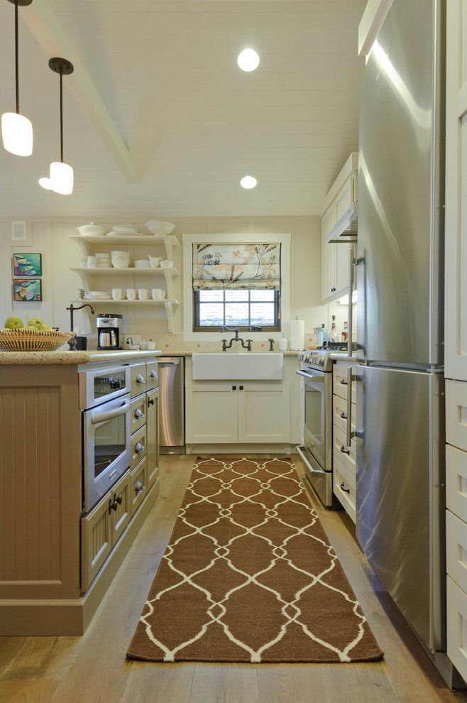 Sherwin Williams Alabaster for a Beach Style Kitchen with a Exposed Dishes and Carmadillo Kitchen|Dining by Regan Baker Design