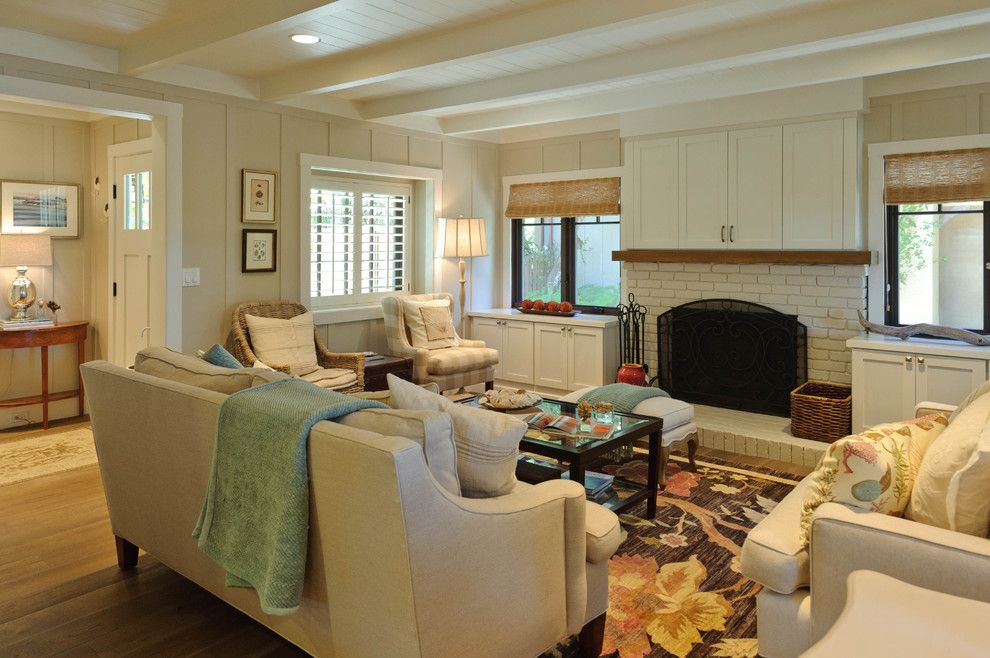 Sherwin Williams Alabaster for a Beach Style Living Room with a Fireplace and Carmadillo Living Room by Regan Baker Design