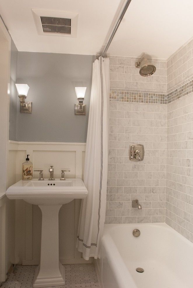 Sherwin Williams Alabaster for a Farmhouse Bathroom with a Glass Tile and Marble Bathroom by Ngd Interiors, Inc