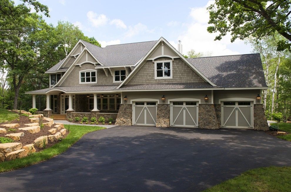 Sherwin Williams Anew Gray for a Traditional Exterior with a Carriage Doors and Hampton Cottage Style Home by Divine Custom Homes