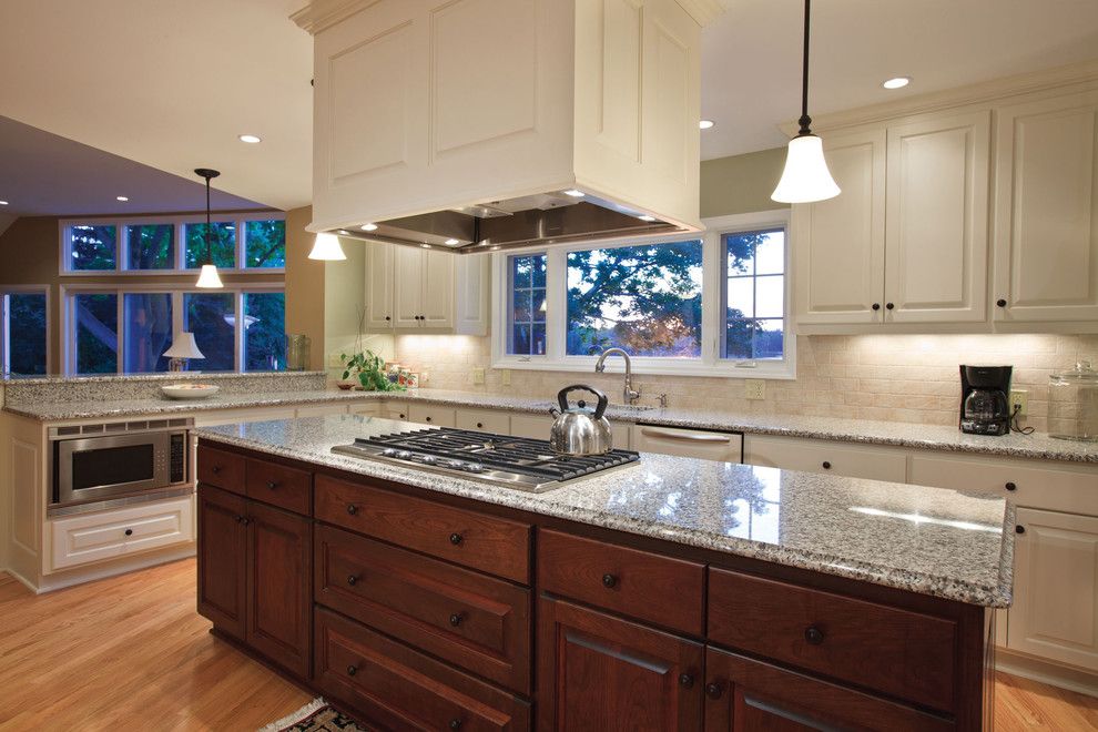 Sherwin Williams Cabinet Paint for a Traditional Kitchen with a Granite Countertops and Kitchen at Dusk by Wade Design & Construction Inc