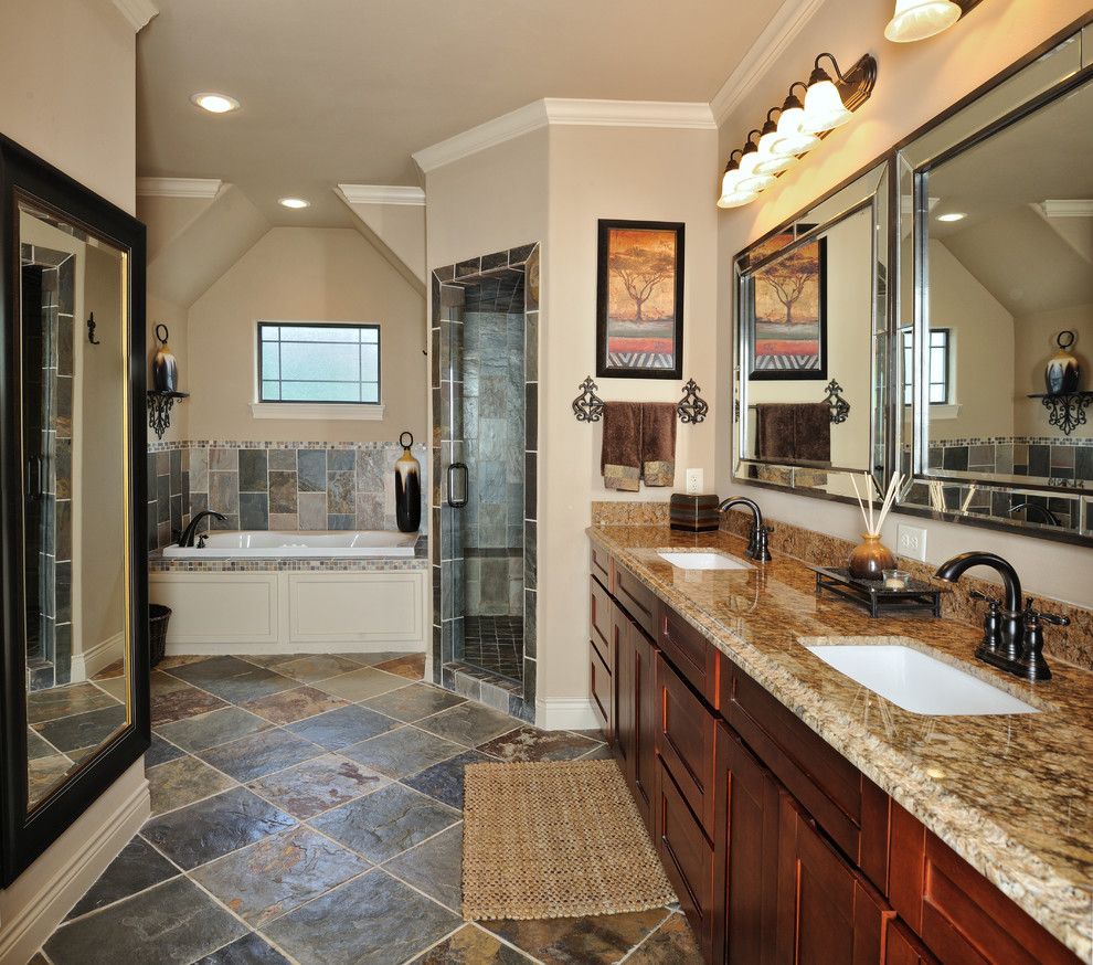 Sherwin Williams Kilim Beige for a Transitional Bathroom with a Tub and Houston Home by Vining Design Associates