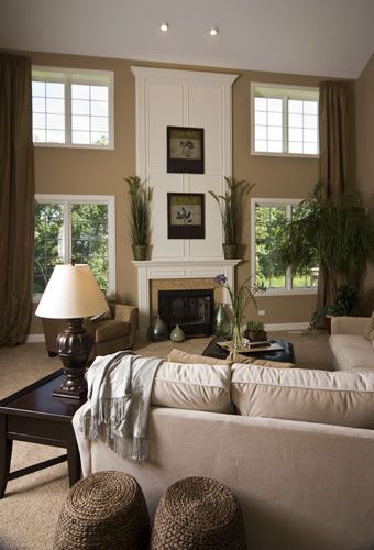 Sherwin Williams Latte for a Eclectic Family Room with a Transitional and Model Home Design by Julea Reinventing Space