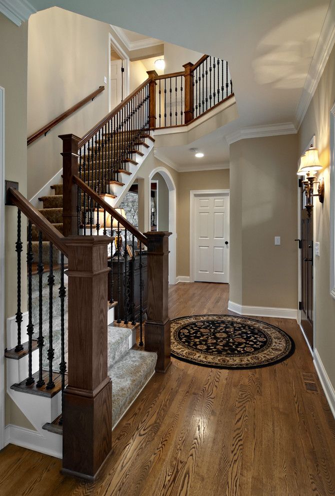 Sherwin Williams Macadamia for a Traditional Staircase with a Foyer and Whole House Remodel by Knight Construction Design Inc.