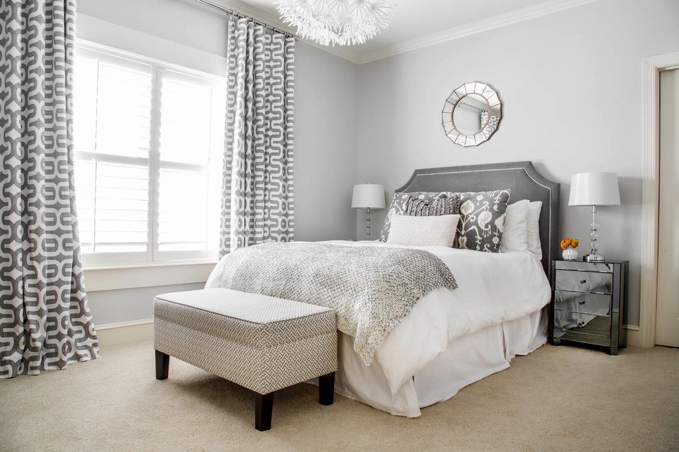 Sherwin Williams Repose Gray for a Transitional Bedroom with a Round Mirror and Bedrooms by Lindsey Binz Home Company