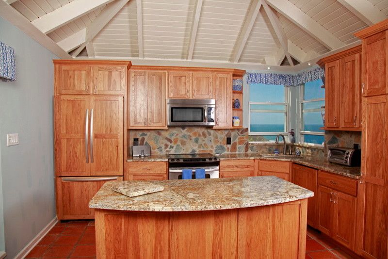 Shiloh Cabinetry for a Traditional Kitchen with a Blue Bit Stone and St. Thomas   Peterborg Kitchen with Shiloh Cabinetry by Virgin Islands Granite & Marble