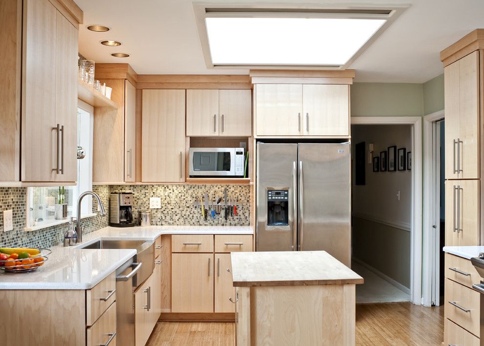 Shiloh Cabinets for a Contemporary Kitchen with a Bamboo Floor and Cool and Bright Kitchen by Rock Paper Hammer