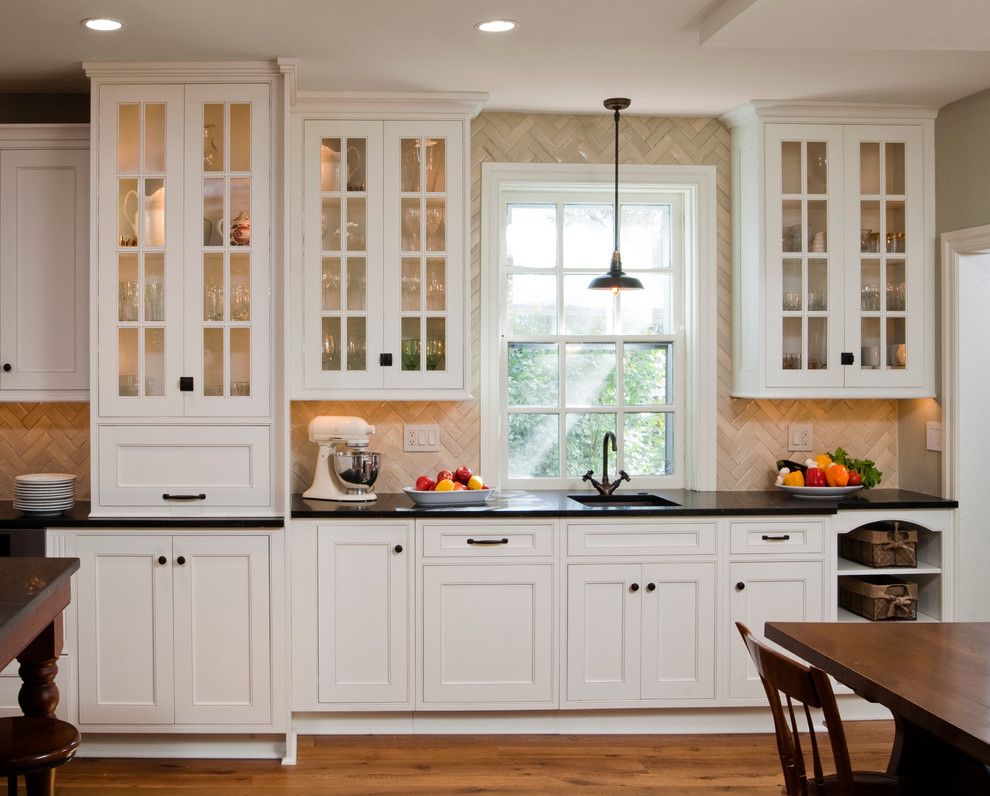 Shiloh Cabinets for a Traditional Kitchen with a Custom Tile Backsplash and Period Inspired Kitchen Remodel: Wayne, Pa by Hometech Renovations, Inc.