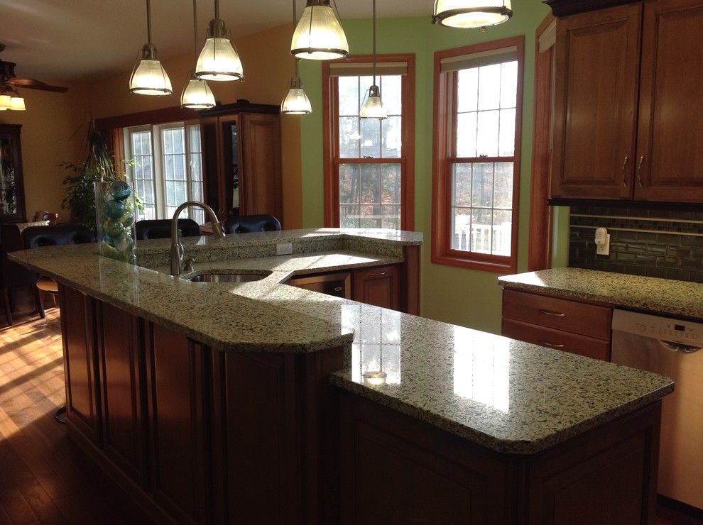 Shoreline Flooring for a Eclectic Kitchen with a Large Island and Vetrazzo Island by Avalon Kitchen