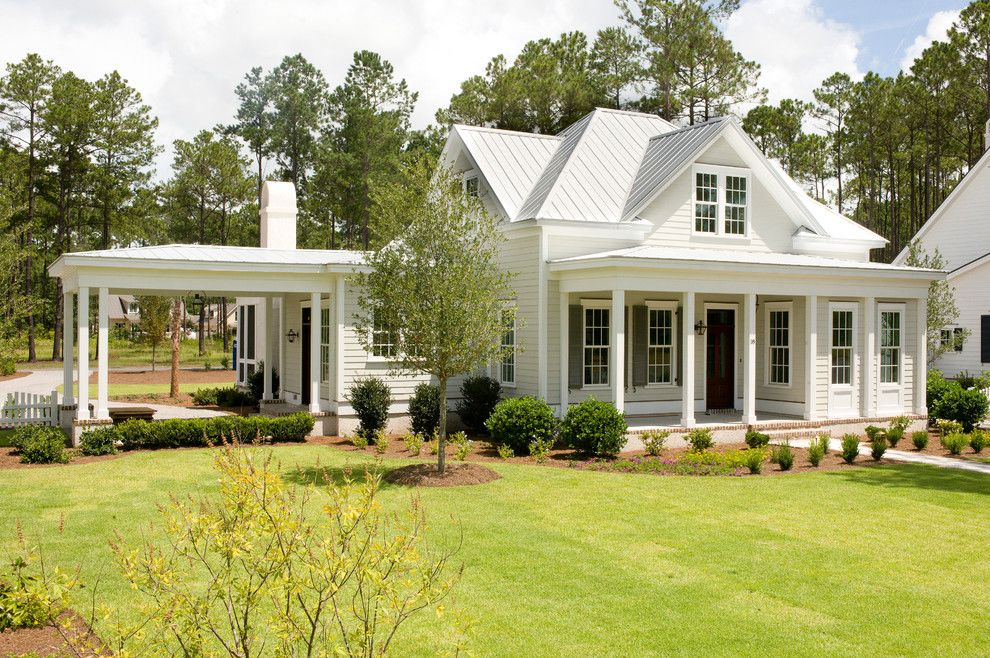 Shoreline Flooring for a Traditional Exterior with a Shutters and the Jekyll by Shoreline Construction and Development