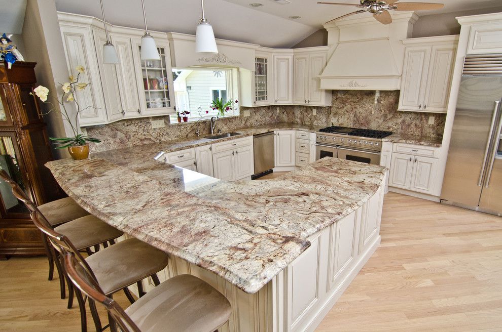 Sienna Bordeaux Granite for a Traditional Kitchen with a White Granite and Typhoon Bordeaux Granite with Full Backsplash by Granite Grannies