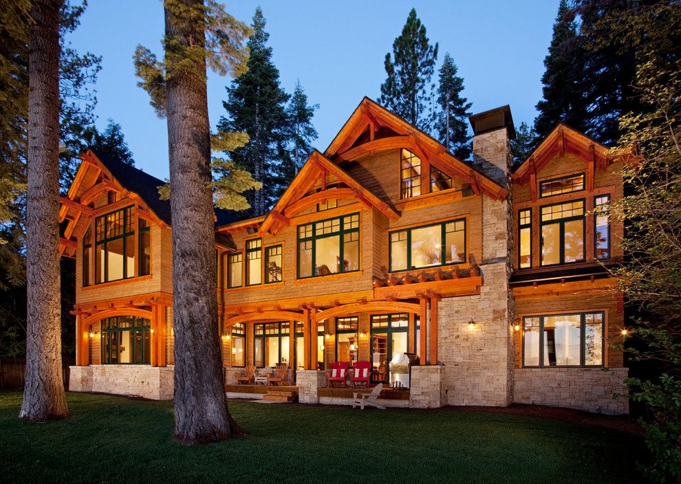 Sierra Pacific Windows for a Rustic Exterior with a Exposed Beams and Weber House West Lake Blvd. by Crestwood Construction Inc.