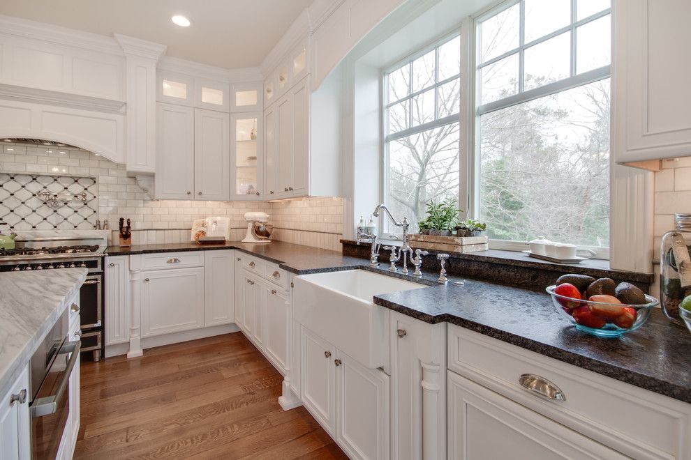 Silver Pearl Granite for a Traditional Kitchen with a Bridge Faucet and Mont Blanc Quartzite & Silver Pearl Granite in a White Kitchen by Stoneshop