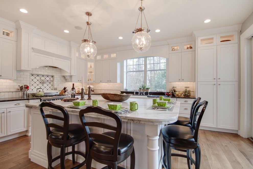 Silver Pearl Granite for a Traditional Kitchen with a Natural Quartzite and Mont Blanc Quartzite & Silver Pearl Granite in a White Kitchen by Stoneshop