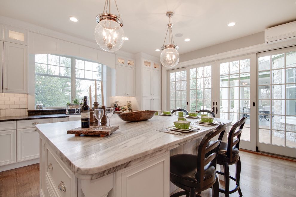 Silver Pearl Granite for a Traditional Kitchen with a White Cabinetry and Mont Blanc Quartzite & Silver Pearl Granite in a White Kitchen by Stoneshop