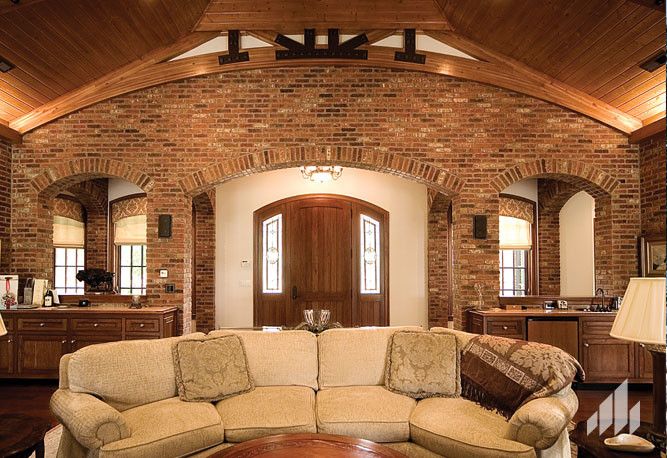 Silverado Building Materials for a Traditional Living Room with a Brick Product and Accent Wall Using the Color, English Pub Thin Brick. by Silverado Building Materials