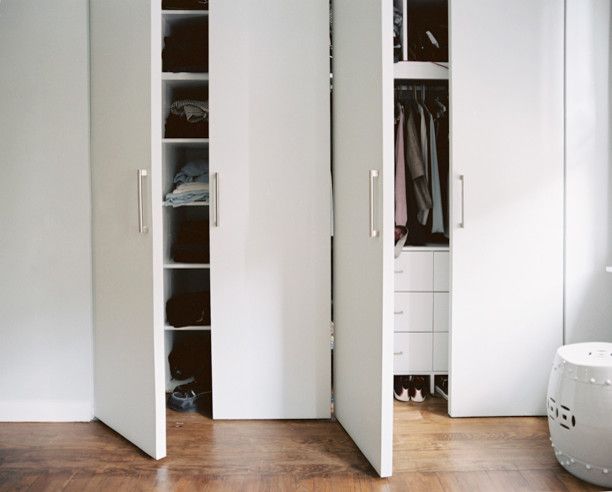 Simons Hardware for a Modern Closet with a Built in Storage and Williamsburg Residence by Leonora Mahle, Llc