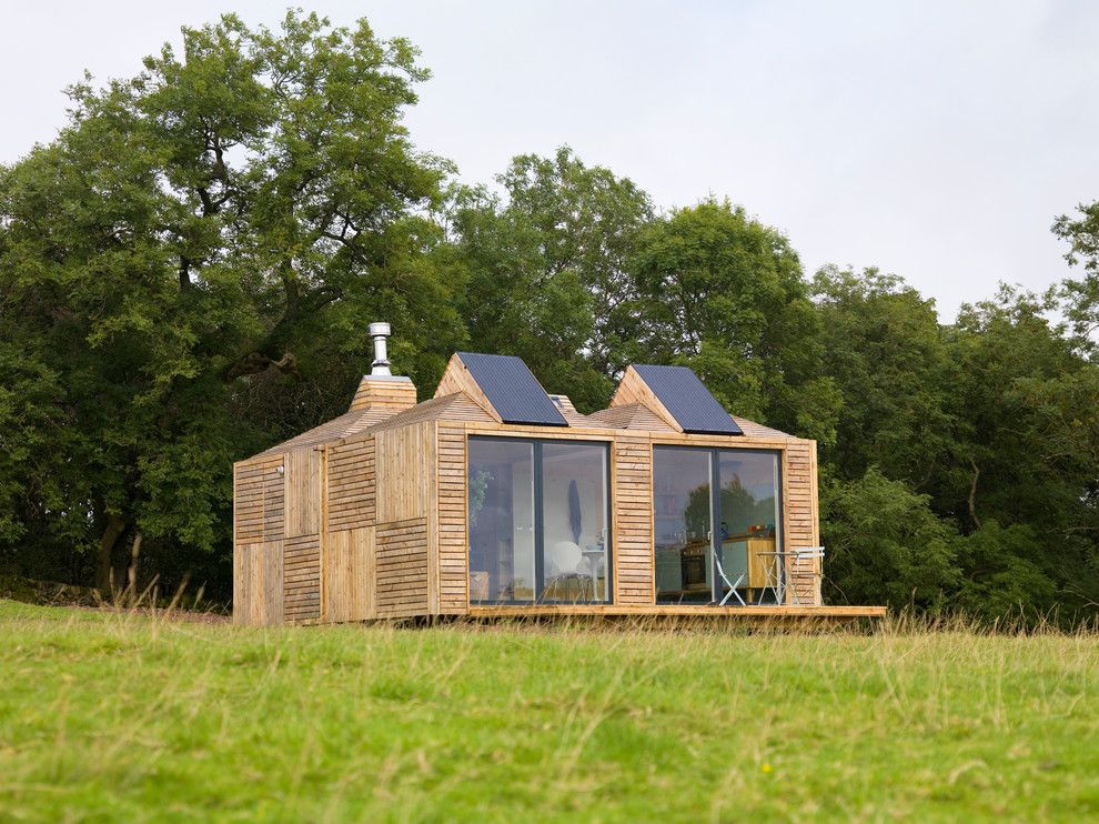 Simple Solar Homesteading for a Rustic Exterior with a Eco and Solar Panels Integrated Into the Bothy's Roof Design. by Echo Living