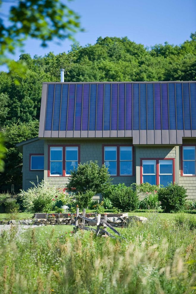 Simple Solar Homesteading for a Rustic Exterior with a Lawn and Environmentally Friendly by Truexcullins Architecture + Interior Design