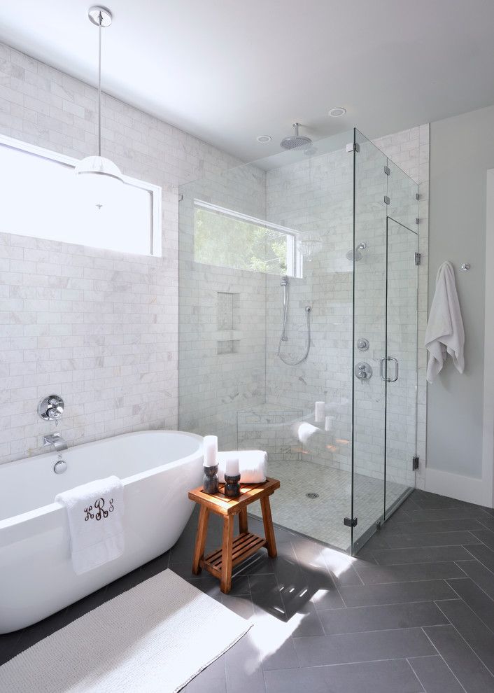 Sitterle Homes for a Transitional Bathroom with a Gray Floor Tile and Forest Hills Modern Farmhouse by Lilli Design