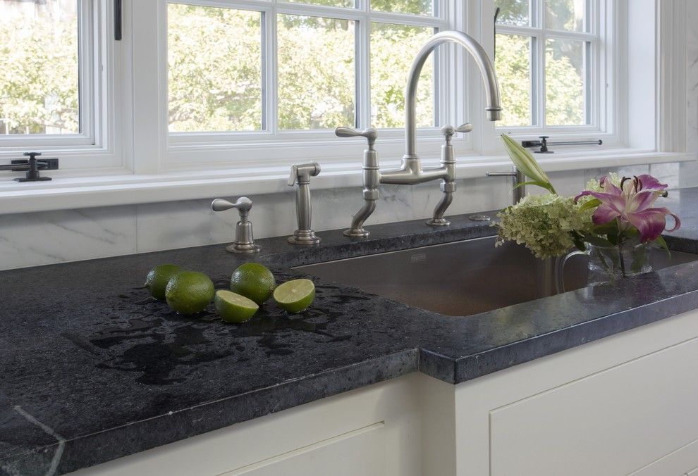 Soap Stone for a Traditional Kitchen with a Antique Oak Flooring and History is in the Details by Jewett Farms + Co.