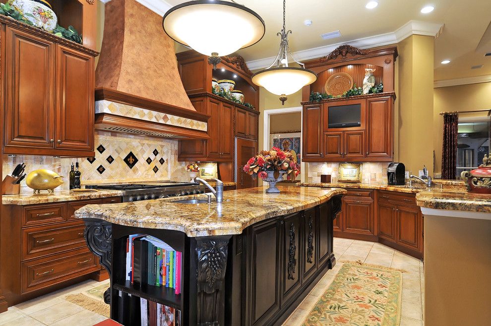 Soapstone vs Granite for a Mediterranean Kitchen with a Tile Backsplash and Grand Kitchen by Bella Luna Services, Inc.