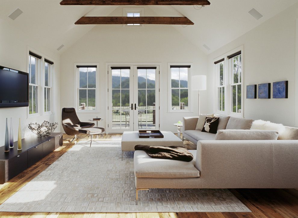 Sofa Mart Denver for a Transitional Living Room with a Exposed Beams and Mountain House by Tim Cuppett Architects