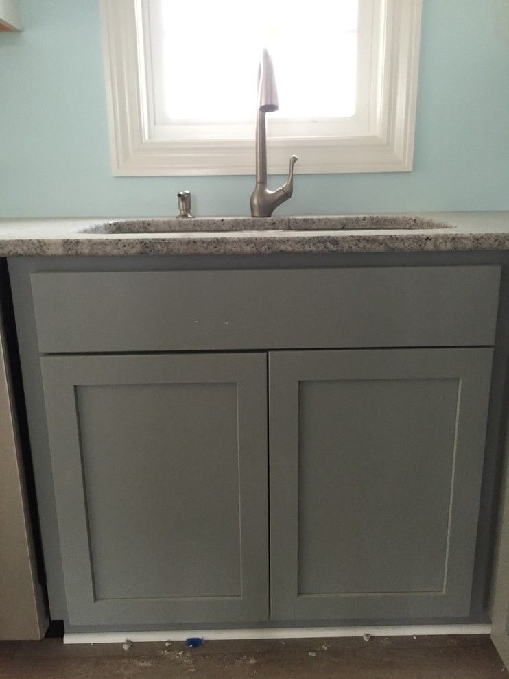 Solera Sinks for a Beach Style Kitchen with a Beach Home and Marblehead Vacation Home by Britany Grieger with Modern Builders Supply