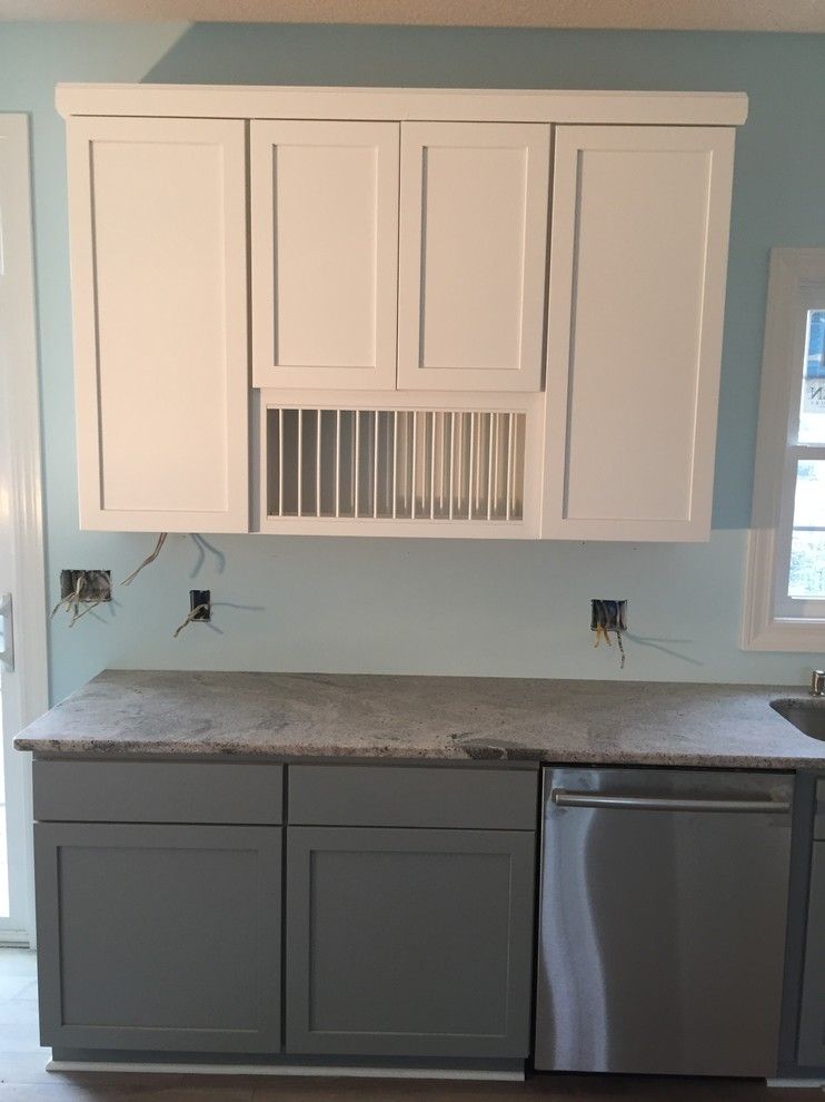 Solera Sinks for a Beach Style Kitchen with a Tinted Varnish and Marblehead Vacation Home by Britany Grieger with Modern Builders Supply