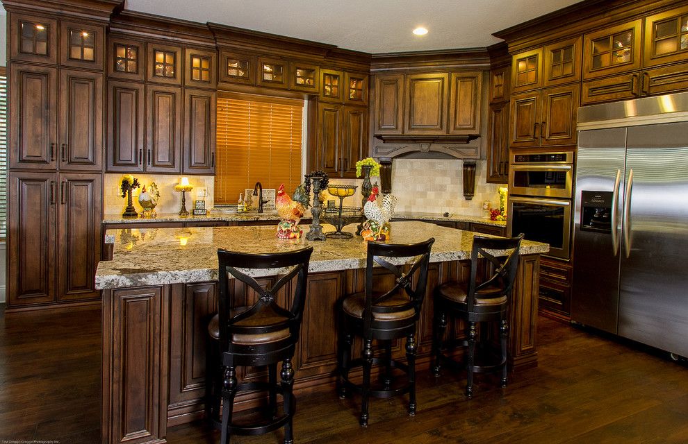 Sollid Cabinetry for a Traditional Kitchen with a Stainless Steel Fridge and Designer Series: Anderson by Sollid Cabinetry