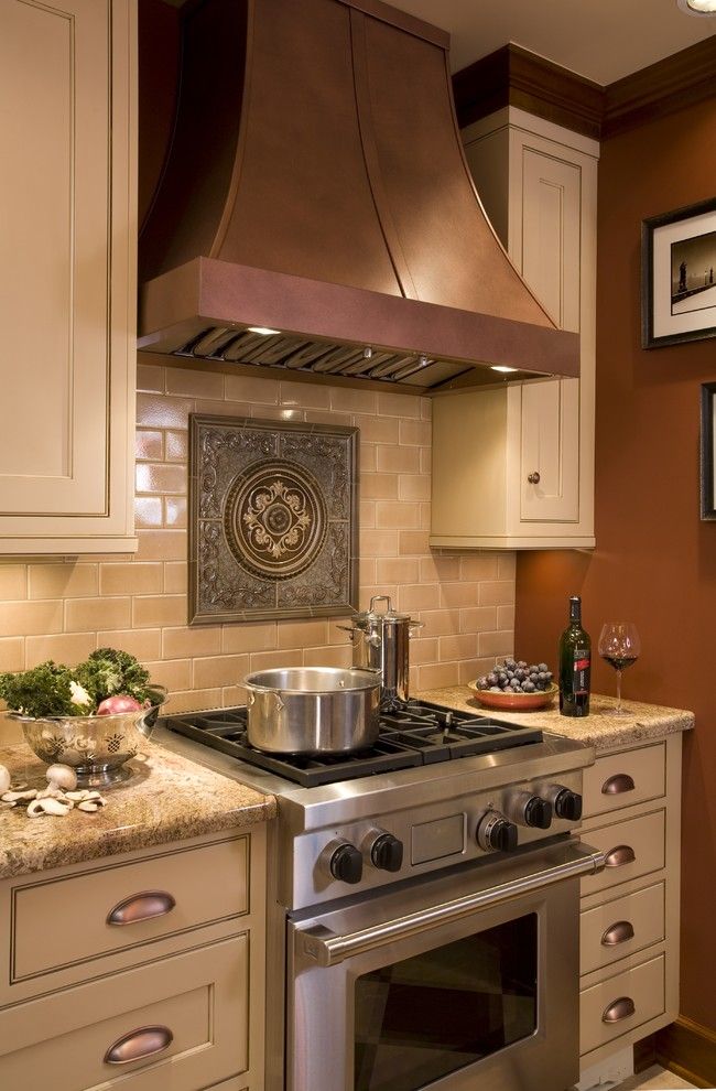 Sonoma Tile for a Traditional Kitchen with a Stainless Steel Appliances and English Tudor Kitchen by Robin Rigby Fisher Cmkbd/caps