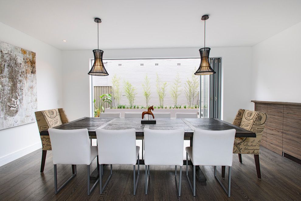 South Dade Lighting for a Contemporary Dining Room with a Carver Chairs and South Coogee   House by Capital Building