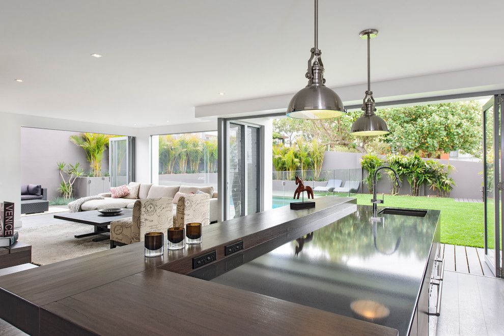 South Dade Lighting for a Contemporary Kitchen with a Pool and South Coogee   House by Capital Building