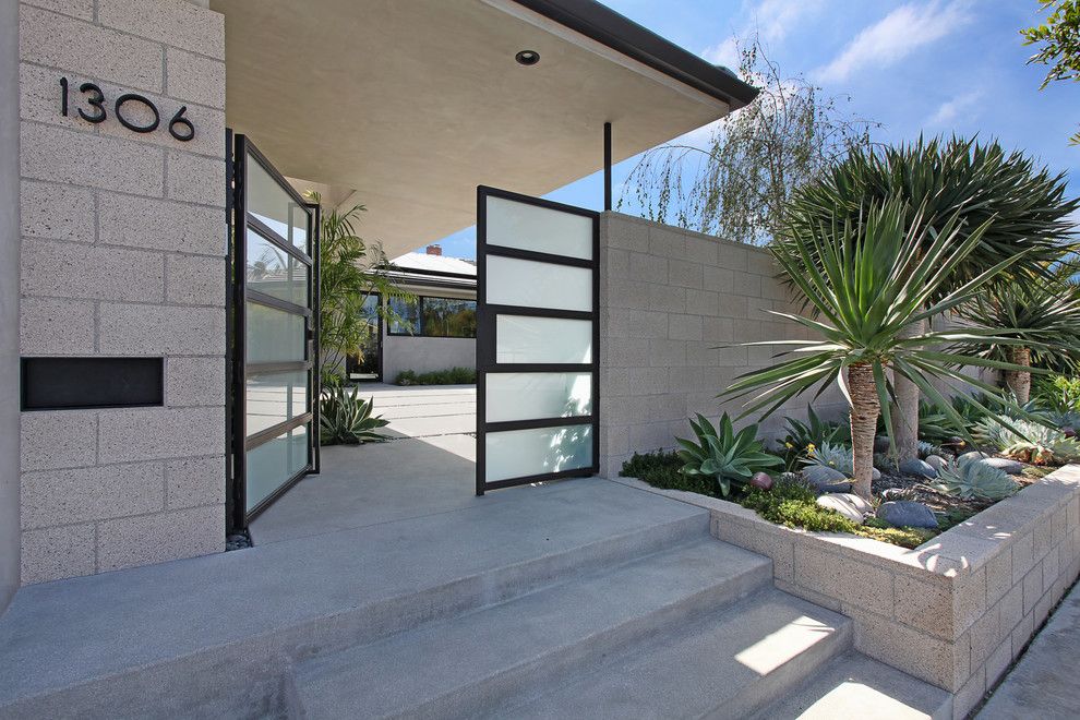 Southgate Glass for a Midcentury Entry with a Modern and Outrigger Residence by Anders Lasater Architects