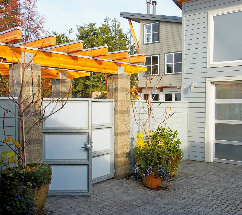 Southgate Glass for a Modern Landscape with a Front Gate and Courtyard Gate. the Hannon Residence is in the Background.. by Dan Nelson, Designs Northwest Architects