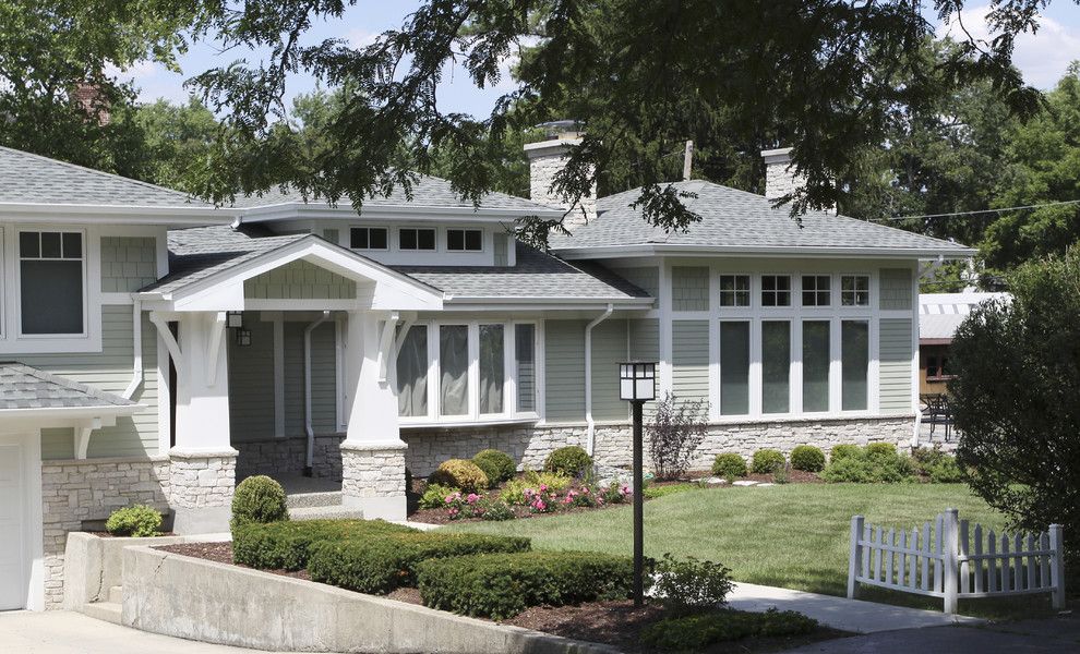 Split Level Remodel for a Craftsman Exterior with a White Trim and Arts and Crafts Clarendon Hills Remodel & Addition by Normandy Remodeling