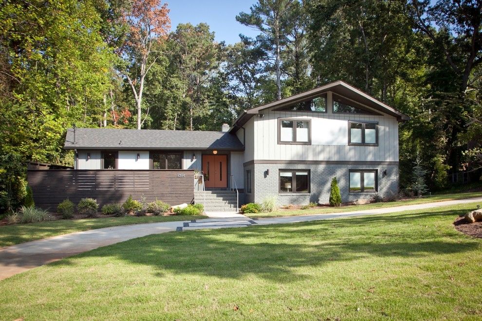 Split Level Remodel for a Midcentury Exterior with a Neutral Colors and Mid Century Modern Atlanta by Valboyd