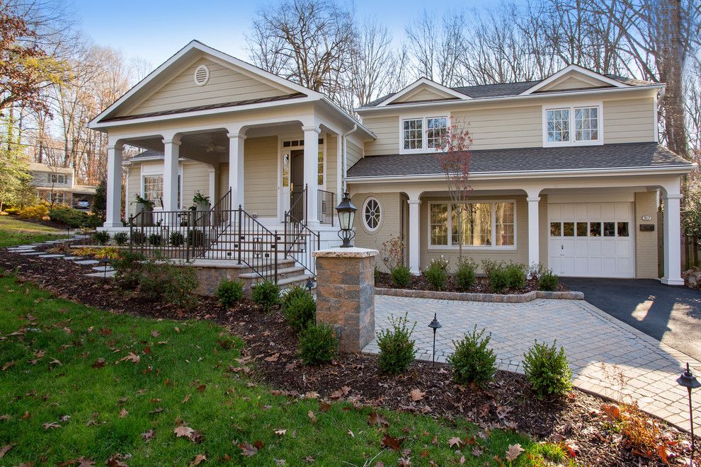 Split Level Remodel for a Traditional Exterior with a Stone Pathway and Split Level Home Remodel in Fairfax by Sun Design Remodeling Specialists, Inc.