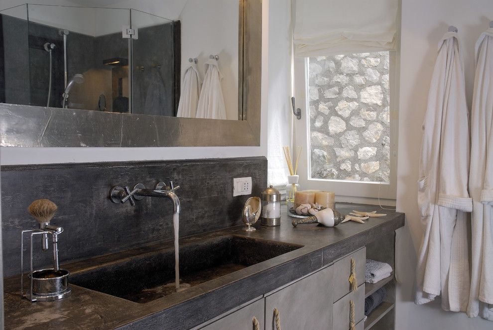 Stained Concrete Countertops for a Mediterranean Bathroom with a Bathroom Shelves and Villa Anacapri, Ancapri   Italy by Fabrizia Frezza Architecture & Interiors