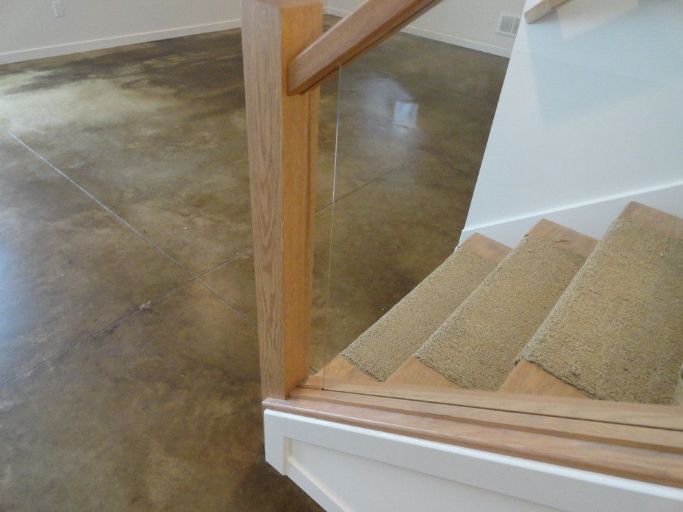 Stained Concrete Floors for a Modern Basement with a Polished Concrete and Stained Concrete Basement Floor by Dancer Concrete Design