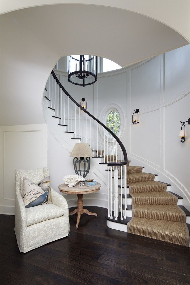 Stanton Carpet for a Beach Style Staircase with a White Upholstered Chair and the Beach House by the Anderson Studio of Architecture & Design