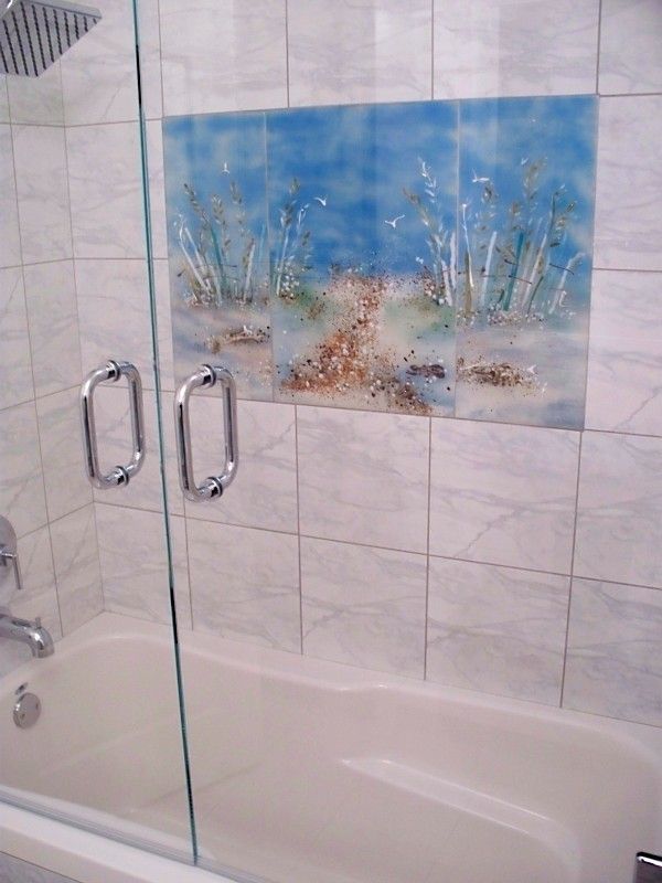 Starfire Glass for a Eclectic Bathroom with a Marble Shower Surround and Glass Shower Mural in Jack and Jill Bath by Beaglesdoitbetter