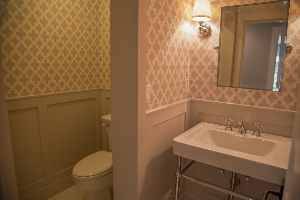 Starion for a Traditional Powder Room with a Bathroom Sink and Powder Room by Starion Custom Residences