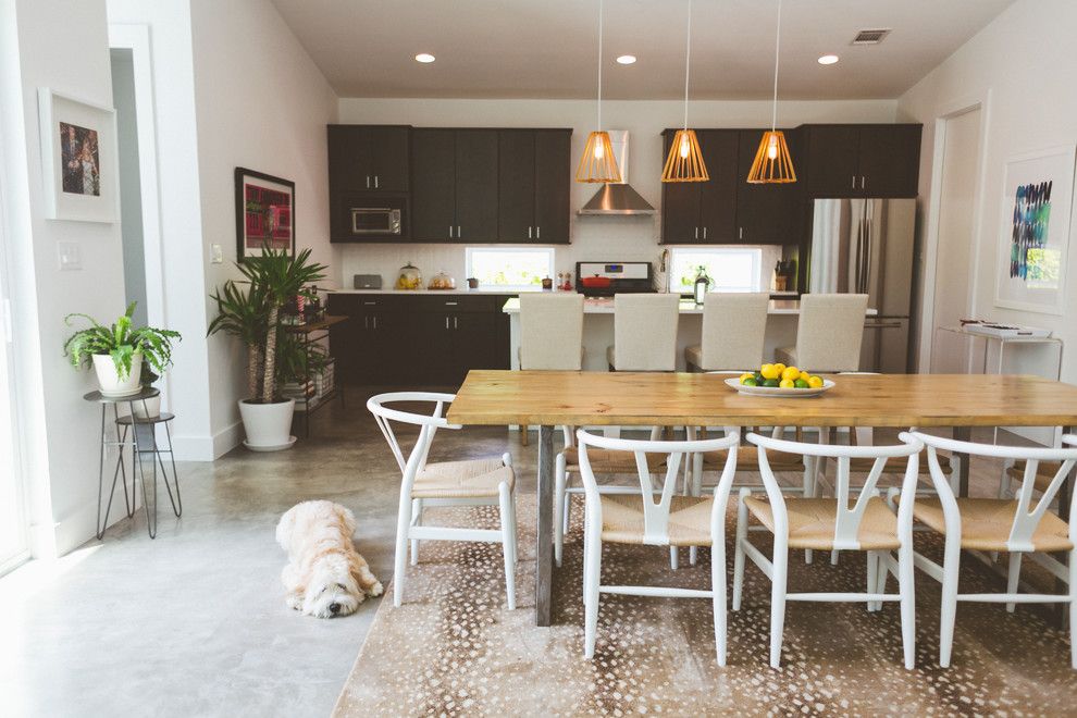 Stark Carpet for a Contemporary Dining Room with a My Houzz and My Houzz: Bright and Boho Austin Home Inspired by a Local Hotel by Heather Banks