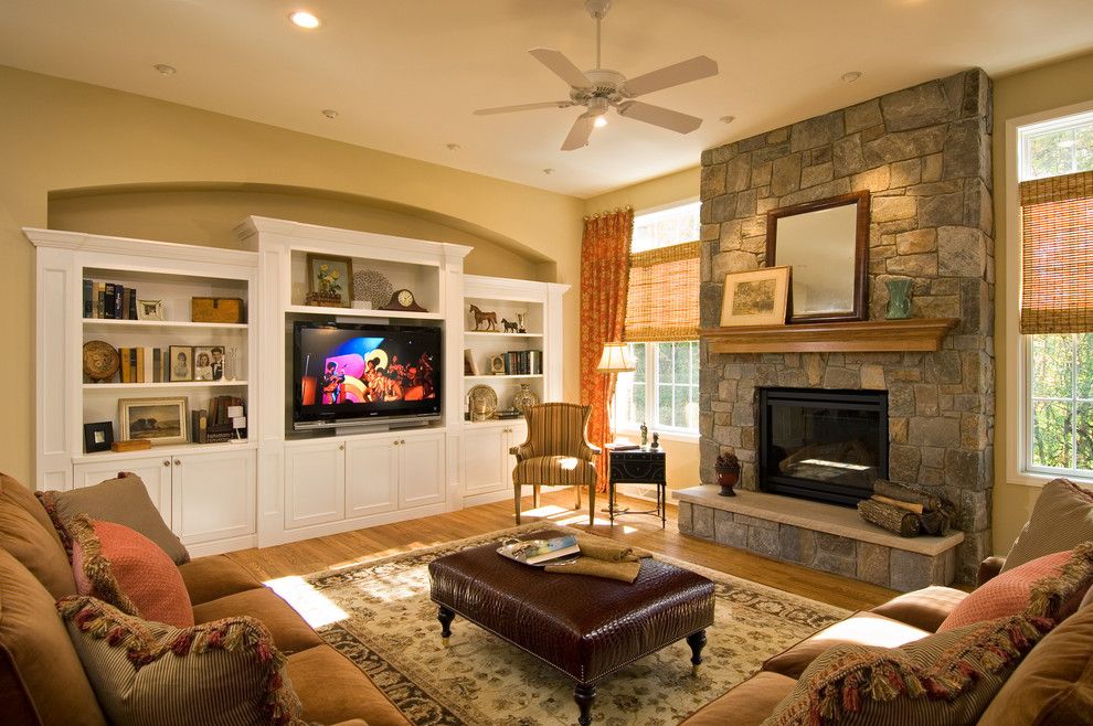 Starmark Cabinets for a Traditional Family Room with a Ceiling Fan and 2008 Saratoga Showcase Home by Belmonte Builders