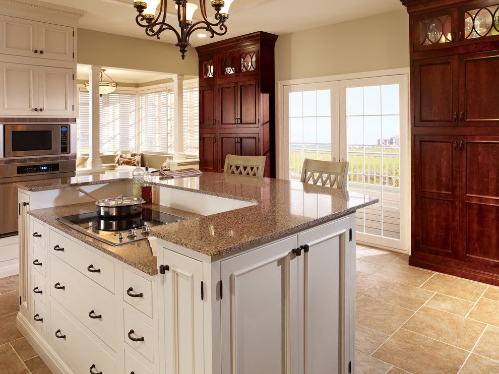 Starmark Cabinets for a Traditional Kitchen with a Bar Stools and Starmark Cabinetry Kitchen in Alexandria Inset Door Style in Maple & Cherry by Starmark Cabinetry